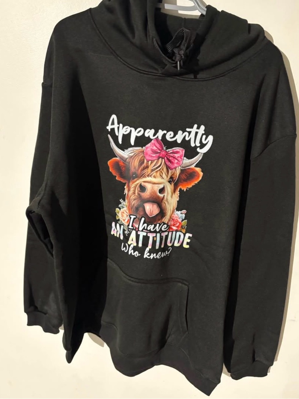 Black Graphic Hoodie with Colorful Cow Design